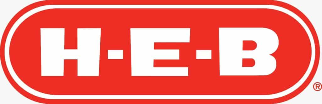 Logotipo H-E-B rojo y blanco con las letras “H-E-B” en texto blanco en negrita sobre un fondo ovalado rojo.
